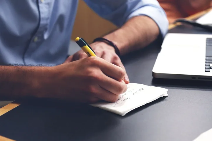 Business professionals shaking hands over a commercial lending deal